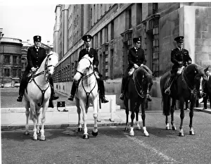 Four police officers on horseback, Central London