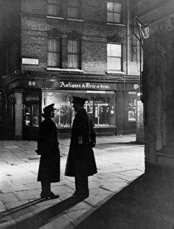 Images Dated 22nd February 2011: Two police officers patrol Shepherds Market, London