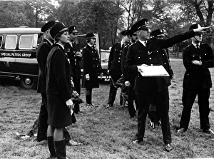 Searching Gallery: Police officers preparing to conduct a search, London