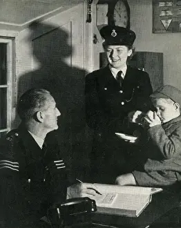 Sleeve Prints: Two police officers working in a police station, London