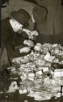 Searching Gallery: Police searching debris after bomb explosion, London