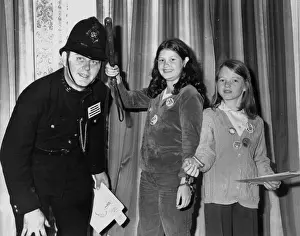 Westward Prints: Policeman in 1920s uniform, with two girls