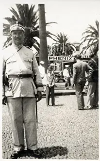 Policeman and Hotel staff Madeira, Portugal Date: circa 1930s