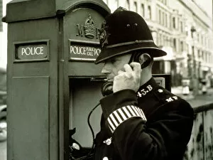 Policeman at a police call box