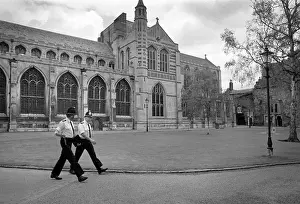 Edmunds Prints: Two policemen march in step past Bury St Edmunds Abbey