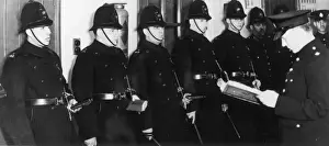 Policemen in station parade room, London