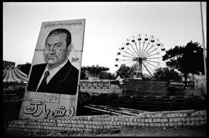Political poster Mubarak and big wheel, Egypt