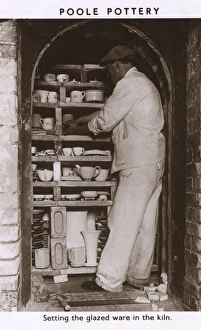 Poole Pottery - Setting the glazed ware in the kiln Poole Pottery - Setting the glazed ware in the kiln