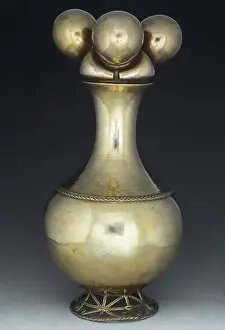 Poporo. Lime container used to carry the lime to