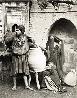 Porter Prints: Porter, water carrier, woman, child in Cairo Egypt