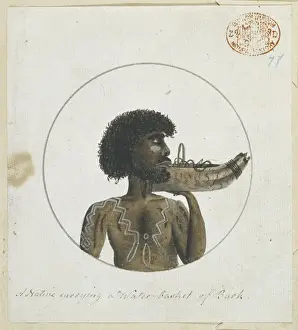 Portrait of an Aboriginal man carrying a basket