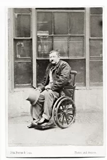 Disabled Collection: Portrait of a disabled man in a Victorian era wheelchair