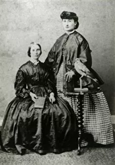 Portrait group of two ladies and bird