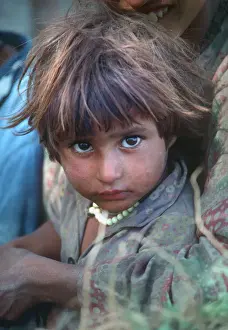 Infant Prints: Portrait of Kashmiri child with brown eyes