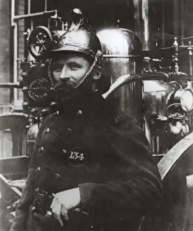 Portrait of a late Victorian MFB fireman with engine