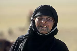 Portrait of middle aged Syrian Bedouin woman with tattoos