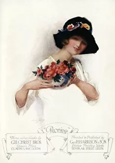 Portrait of a woman holding a bowl of peonies flowers