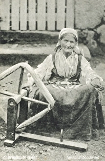 Images Dated 24th March 2011: Portugal - Woman spinning - Douro region