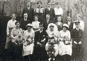 A post WW1 group weddig photograph, taken in a suburban back garden. Date: 1919 A post WW1 group weddig photograph, taken in a suburban back garden. Date: 1919