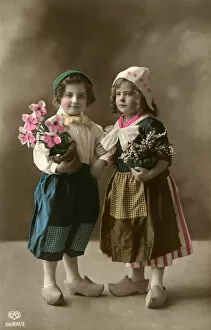 Clogs Gallery: Postcard, Dutch boy and girl with flowers
