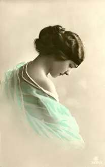 Postcard, young woman in an elegant pose