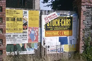 Posters on a fence, western France