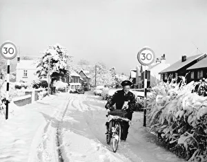 Images Dated 7th February 2008: Postman in the Snow