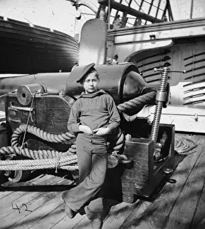 Powder monkey by gun of USS. New Hampshire off Charleston, S