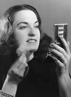 Chin Prints: Powdering her Chin