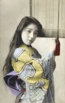 Pretty Japanese girl and roll blind
