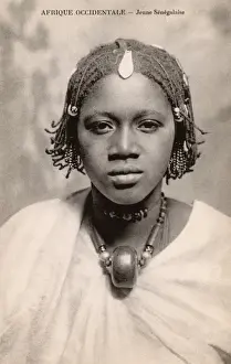 Senegal Prints: Pretty Young Senegalese girl with braided hair and necklace