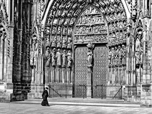 Images Dated 30th October 2019: Priest walking in front of Strasbourg Cathedral, France
