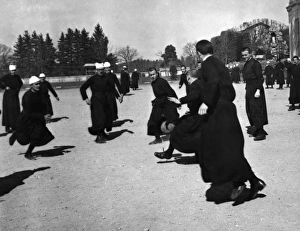 Images Dated 16th May 2011: Priests Playing Football