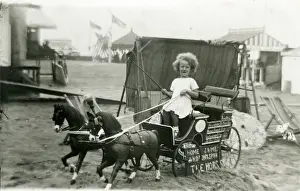 Primative Fairground / Beach Amusements - Girl on buggy