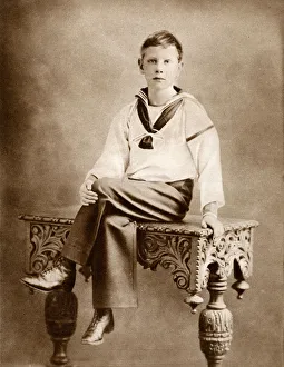 Images Dated 14th November 2017: Prince Albert George sitting on a table in relaxed pose