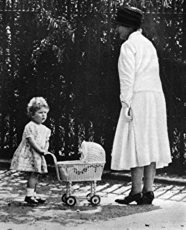 Images Dated 8th July 2011: Princess Elizabeth playing with a toy pram