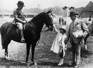 Gymkhana Prints: Princess Elizabeth stroking a pony