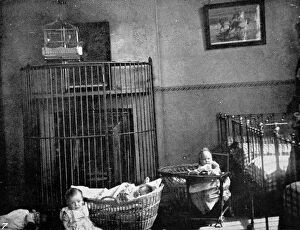 Prison babies in chairs and cots in the day nursery
