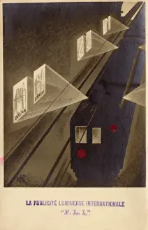 Projected Prints: Projecting advertisements from a moving train