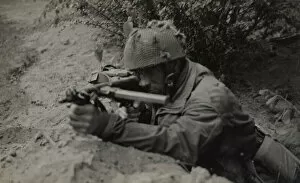 Images Dated 23rd August 2016: Pte J Connington of Selby, Yorks, in action with Sten gun