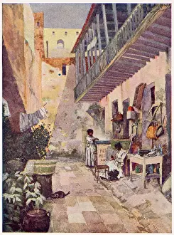 Puerto Prints: Puerto Rico: a domestic courtyard with washing hanging out to dry. Date: 1908