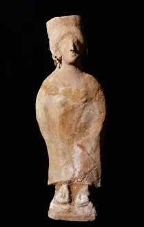 Slopes Prints: Punic Art. Figurine of a goddess with slopes. Terracota. Fro