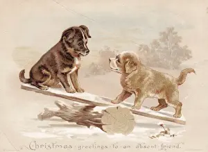 Two puppies on a seesaw on a Christmas card