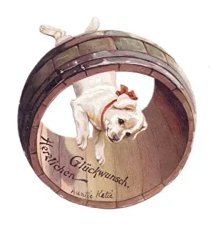 Puppy with barrel on a German Good Luck card