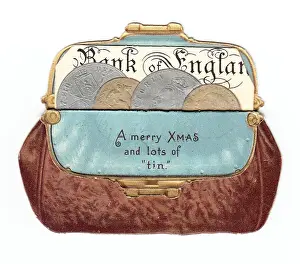 Purse full of money on a cutout Christmas card