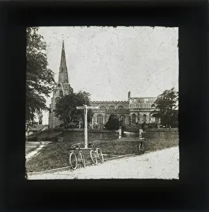 Images Dated 20th May 2019: Push bikes resting against a road sign on village green