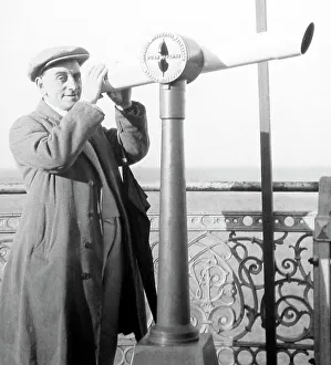 A push penny auto-telescope at the seaside, probably 1920s
