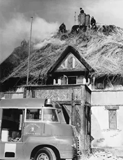 Putting out Thatch Fire