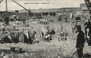 Portland Prison, Dorset, opened in 1848 as a public works prison for convicts who were employed in quarries in the area. This view shows small groups of men cutting stone by hand while prison officers watch over them. The stone is taken away on railway wagons Quarries, Portland Prison, Dorset