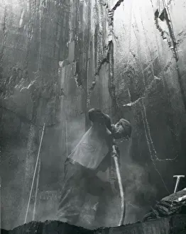 Quarryman drilling, Penyrorsedd Slate Quarry, North Wales